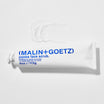 Malin+Goetz Jojoba Face Scrub tubo y textura