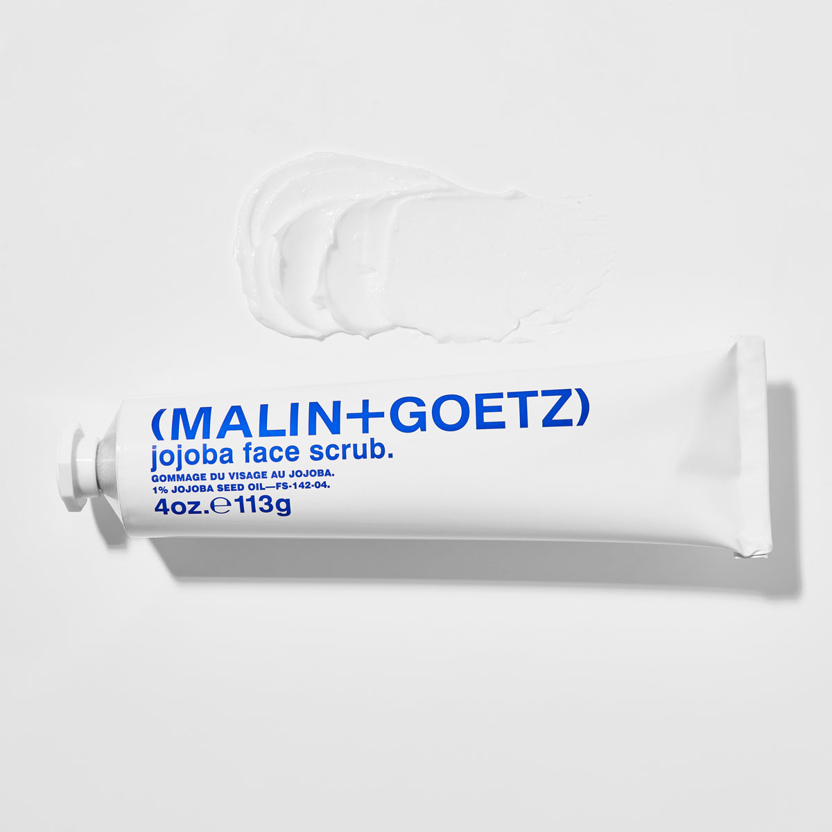 Malin+Goetz Jojoba Face Scrub tubo y textura