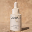 Alpha-H Hyaluronic 8 Super Serum frasco sobre arenisca