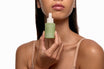 Alpha-H Vitamin A Serum modelo con el frasco