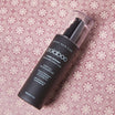 Oolaboo Moisty Seaweed 24 Benefits Instant Cure sobre estampado floral rosa