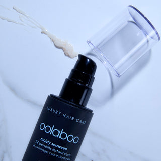 Oolaboo Moisty Seaweed 24 Benefits Instant Cure met crèmetextuur op marmer