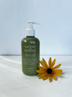 Oolaboo Nature As Essence Guardian Angel Primer frasco con dosificador con flor amarilla