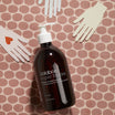 Oolaboo Super Foodies No Rinse Hand Gel entre manos de papel