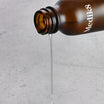Medik8 C-Tetra Luxe 30ml sérum saliendo del frasco